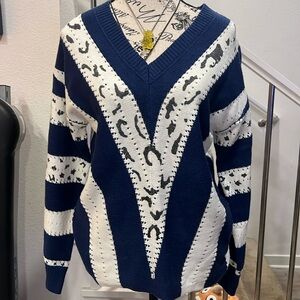 Blue and white V-neck ribbed sweater